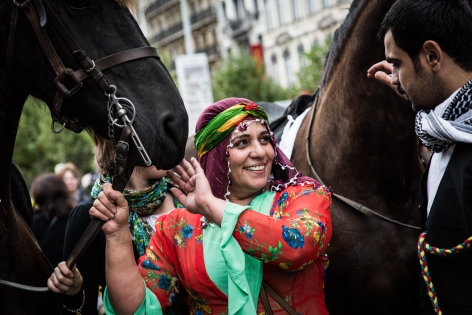 AB392435 On the occasion of the 2nd edition of the Kurdish Cultural Week in Brussels, a march with traditional costumes, music, and with a couple riding horses like done during weddings went through the center of the city.