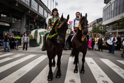 AB392438 On the occasion of the 2nd edition of the Kurdish Cultural Week in Brussels, a march with traditional costumes, music, and with a couple riding horses like done during weddings went through the center of the city.